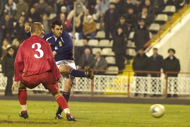 Steven Thompson gets Scotland back on level terms in the 1-1 draw in Moldova in 2004