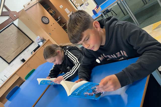 The Cardenden Primary School pupils enjoying their new books