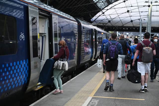ScotRail passengers at Glasgow Queen Street station. Picture: John Devlin