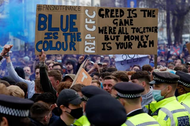 Thousands of Chelsea fans took to the streets outside the club in London to protest against the short-lived Super League plan (Picture: Adrian Dennis/Getty Images)