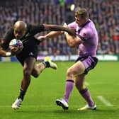 Mark Telea scores New Zealand's fourth try to put the game beyond Scotland. (Photo by David Rogers/Getty Images)