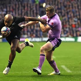 Mark Telea scores New Zealand's fourth try to put the game beyond Scotland. (Photo by David Rogers/Getty Images)