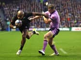 Mark Telea scores New Zealand's fourth try to put the game beyond Scotland. (Photo by David Rogers/Getty Images)