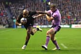Mark Telea scores New Zealand's fourth try to put the game beyond Scotland. (Photo by David Rogers/Getty Images)