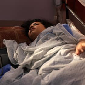 Dunia Abu Mohsen, 12, lost her leg in a bomb blast that killed her family. She was killed when the Nasser hospital in Khan Yunis, southern Gaza Strip, was shelled (Picture: Mahmud Hams/AFP via Getty Images)
