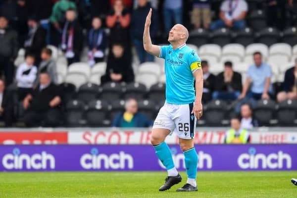 Dundee captain Charlie Adam reacts in despair after his error had gifted St Mirren an early lead in the Premiership fixture in Paisley on Saturday. (Photo by Ross MacDonald / SNS Group)