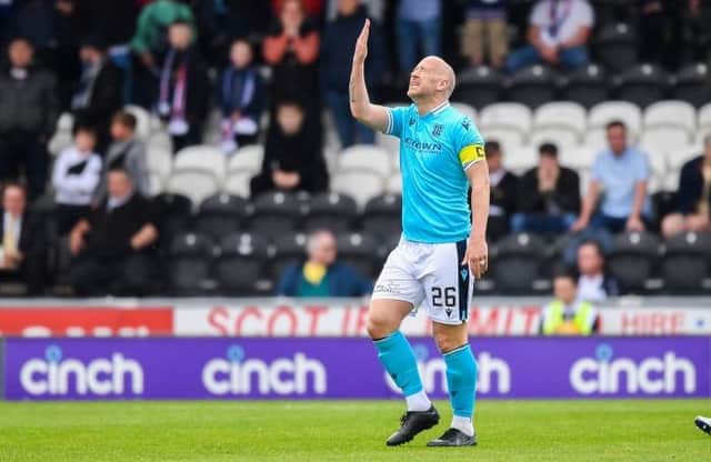 Dundee captain Charlie Adam reacts in despair after his error had gifted St Mirren an early lead in the Premiership fixture in Paisley on Saturday. (Photo by Ross MacDonald / SNS Group)