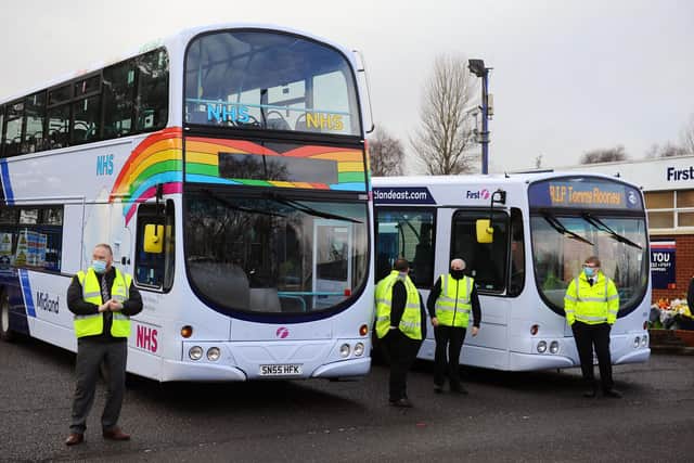 The funeral cortege at the Larbert depot for First Midland driver Tommy Rooney, who died last February after contracting Covid. Picture: Michael Gillen