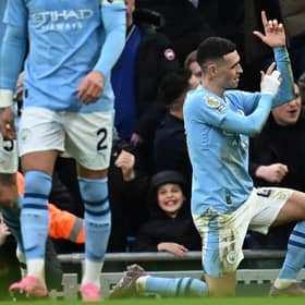 Manchester City's English midfielder Phil Foden celebrates.