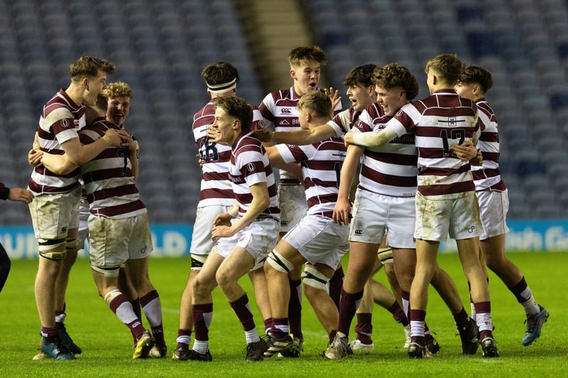 George Watson's players celebrate at full time after the 42-21 victory over Stewart's Melville College in the Schools Under-18 Cup final at Murrayfield.