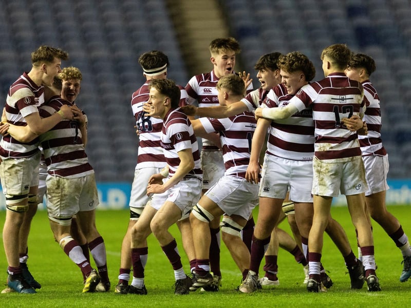 George Watson's players celebrate at full time after the 42-21 victory over Stewart's Melville College in the Schools Under-18 Cup final at Murrayfield.