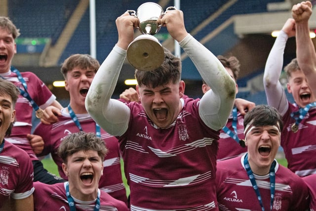 George Watson's captain Michael Connor with the trophy after the under-16 final