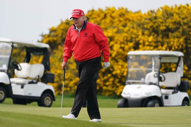 Former US president Donald Trump playing golf at  his Turnberry course. Picture: Andrew Milligan/PA Wire