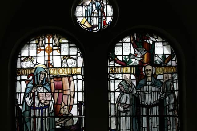 St Moluag and his contemporary St Columba depicted in a stain glass window at St Moluag's Cathedral in Lismore. PIC: Otter/Cc