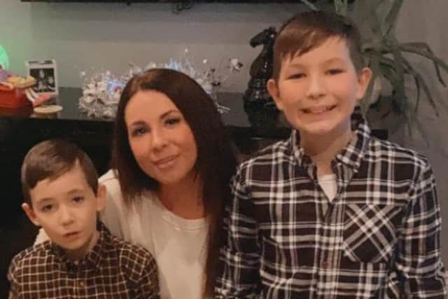 Cole Thomson, 8, with mother Lisa Quarrell, 39 and brother Dylan Thomson, 11.