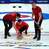 Great Britain's Hammy McMillan, Bruce Mouat and Bobby Lammie during day six of the Beijing 2022 Winter Olympic Games at the National Aquatics Centre in China (Image credit: Andrew Milligan/PA Wire)