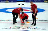 Great Britain's Hammy McMillan, Bruce Mouat and Bobby Lammie during day six of the Beijing 2022 Winter Olympic Games at the National Aquatics Centre in China (Image credit: Andrew Milligan/PA Wire)