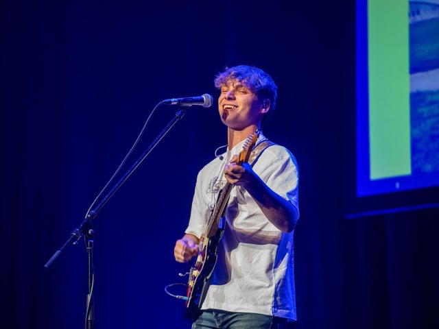 Musician Ben Walker performing at YPI National Event 2025