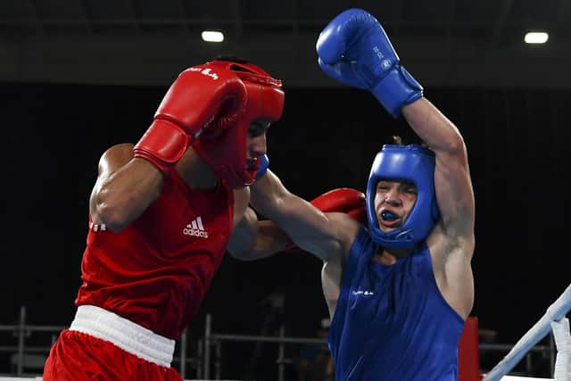 Maksym Galinichev, pictured here boxing Abdessamad Abbaz of Morocco in the Men's Bantam semi final at the Buenos Aires 2018 Youth Olympic Games, has been killed in combat.