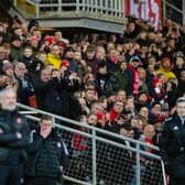 Barry Robson (background) was the happier manager - in his case, interim manager - as Aberdeen beat Jim Goodwin's Dundee United 3-1 at Tannadice.  (Photo by Mark Scates / SNS Group)