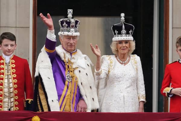 King Charles III and Queen Camilla on the balcony of Buckingham Palace, London, following the coronation.