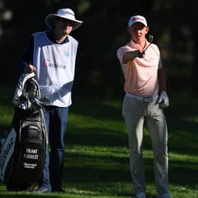 Grant Forrest talks through a shot with caddie John McClure during the Open de Espana at Club de Campo Villa de Madrid. Picture: Stuart Franklin/Getty Images.