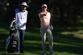 Grant Forrest talks through a shot with caddie John McClure during the Open de Espana at Club de Campo Villa de Madrid. Picture: Stuart Franklin/Getty Images.