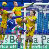 St Johnstone's Guy Melamed (L-R), Hibs' Paul McGinn, St Johnstone's Callum Booth, and Hibs' Ryan Porteous and Paul Hanlon in action during the league clash at McDiarmid Park. Photo by Alan Harvey / SNS Group