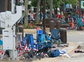 Belongings are shown left behind at the scene of a mass shooting along the route of a Fourth of July parade in Highland Park, Illinois.