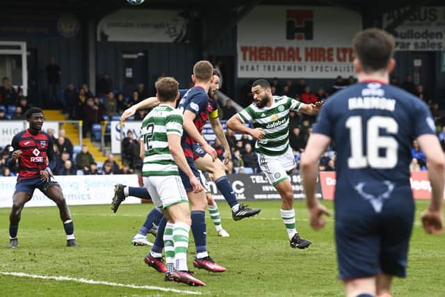 Celtic were awarded a penalty after Ross County captain Alex Iacovitti handled the ball in the box under pressure from Cameron Carter-Vickers