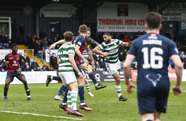 Celtic were awarded a penalty after Ross County captain Alex Iacovitti handled the ball in the box under pressure from Cameron Carter-Vickers