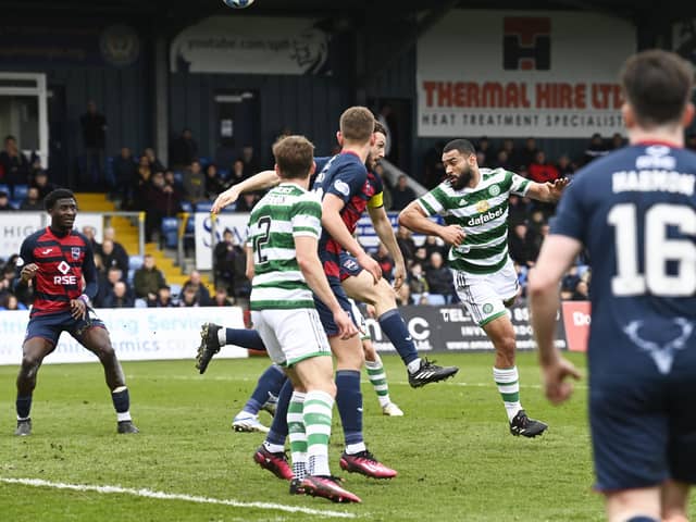 Celtic were awarded a penalty after Ross County captain Alex Iacovitti handled the ball in the box under pressure from Cameron Carter-Vickers