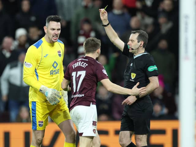 Alan Forrest was booked for simulation during Hearts' 2-2 draw against Ross County.