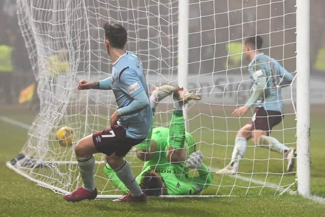Jamie Walker nets Hearts' winner.