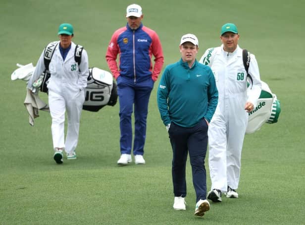 Bob MacIntyre walks with Lee Westwood during the third round of The Masters in April. Picture: Andrew Redington/Getty Images.