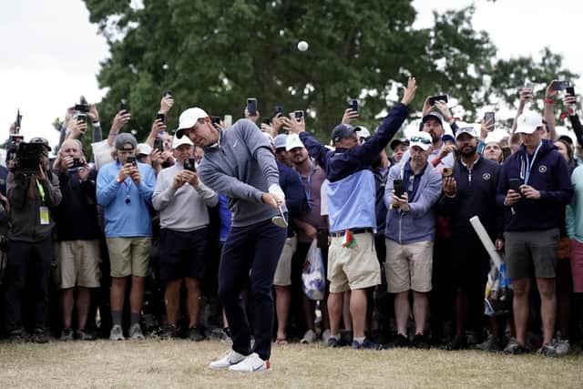 Rory McIlroy, of Northern Ireland, hits on the 17th hole during the third round of the U.S. Open golf tournament at The Country Club, Saturday, June 18, 2022, in Brookline, Mass. (AP Photo/Charlie Riedel)