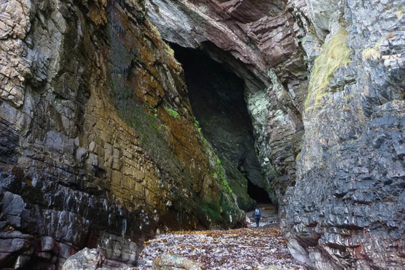 Said to be the deepest Hebridean sea cave at 500ft, MacKinnon’s Cave rests on the Isle of Mull’s west coast near Gribun. The early Celtic monk, Abbot MacKinnon, was supposedly concealed there in the 15th century. Deep within the cave, explorers can find a large, flat rock slab known as “Fingal’s Table” which was reputedly used as an altar by early followers of the Christian church. MacKinnon’s Cave is also infamous in local folklore as a site where murderous fairies dwell.