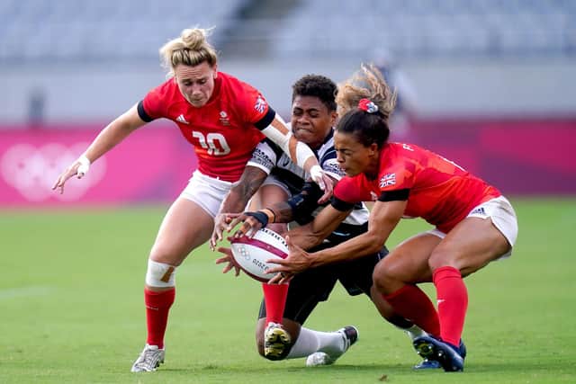 Fiji's Vasiti Solikoviti (centre) is tackled by Great Britain's Megan Jones (left) and Deborah Fleming during the Rugby Sevens Women's Bronze Medal match at the Tokyo Stadium (Adam Davy/PA Wire)