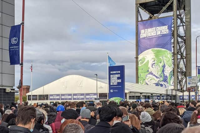 Massive queues built up at the main entrance to the COP26 climate summit in Glasgow as hundreds of people waited to get through security checks before being granted access to the event
