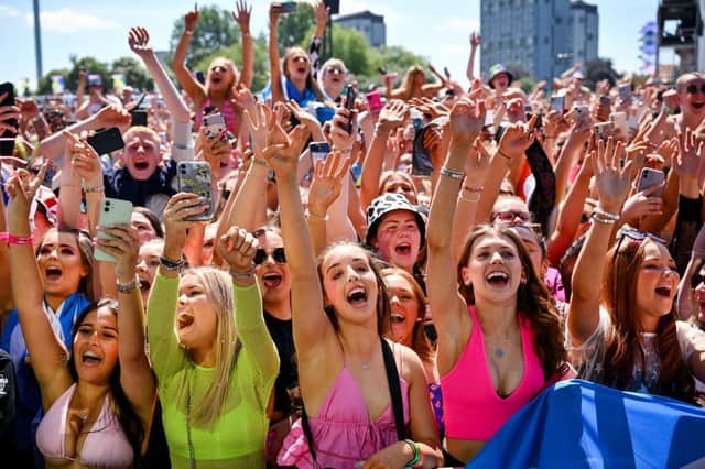 Festival goers watch Example perform on the main stage during TRNSMT 2022.