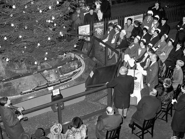 Christmas tree lights being switched on in Waverley Station, Edinburgh, in 1965.