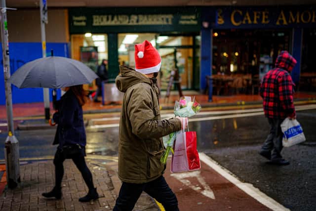 Shoppers headed out to the high street in the run-up to Christmas despite poor weather and cost-of-living pressures.