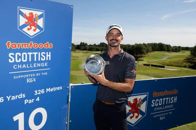 Brandon Robinson Thompson shows off the trophy after winning the Farmfoods Scottish Challenge supported by the R&A at Newmachar Golf Club. Picture: Paul Devlin/Getty Images.