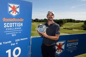 Brandon Robinson Thompson shows off the trophy after winning the Farmfoods Scottish Challenge supported by the R&A at Newmachar Golf Club. Picture: Paul Devlin/Getty Images.