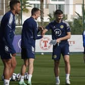 Kieran Tierney jokes with David Turnbull during Scotland training session at La Finca, Spain. (Photo by Jose Breton / SNS Group)