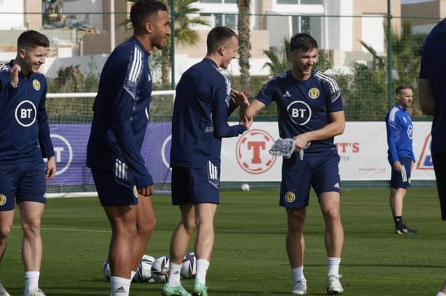 Kieran Tierney jokes with David Turnbull during Scotland training session at La Finca, Spain. (Photo by Jose Breton / SNS Group)