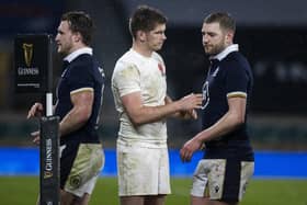 Scotland's Finn Russell and Owen Farrell after the Calcutta Cup match at Twickenham in 2021. (Photo by Craig Williamson / SNS Group)