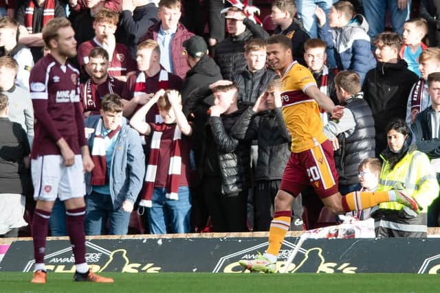 Joe Efford celebrates opening the scoring for Motherwell against Hearts.