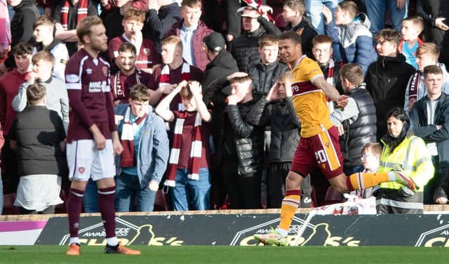 Joe Efford celebrates opening the scoring for Motherwell against Hearts.