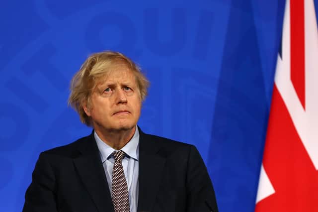 Prime Minister Boris Johnson struck a sombre tone during the press conference.